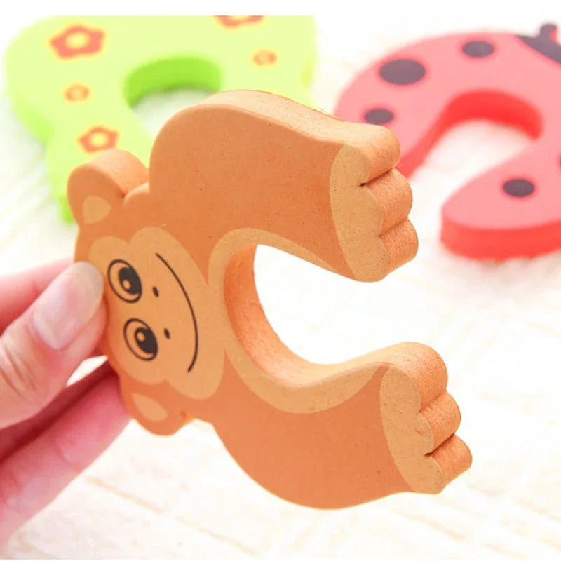 1 2 5 7PCS Child Safety Cartoon Pattern Protection Lock - top-down view